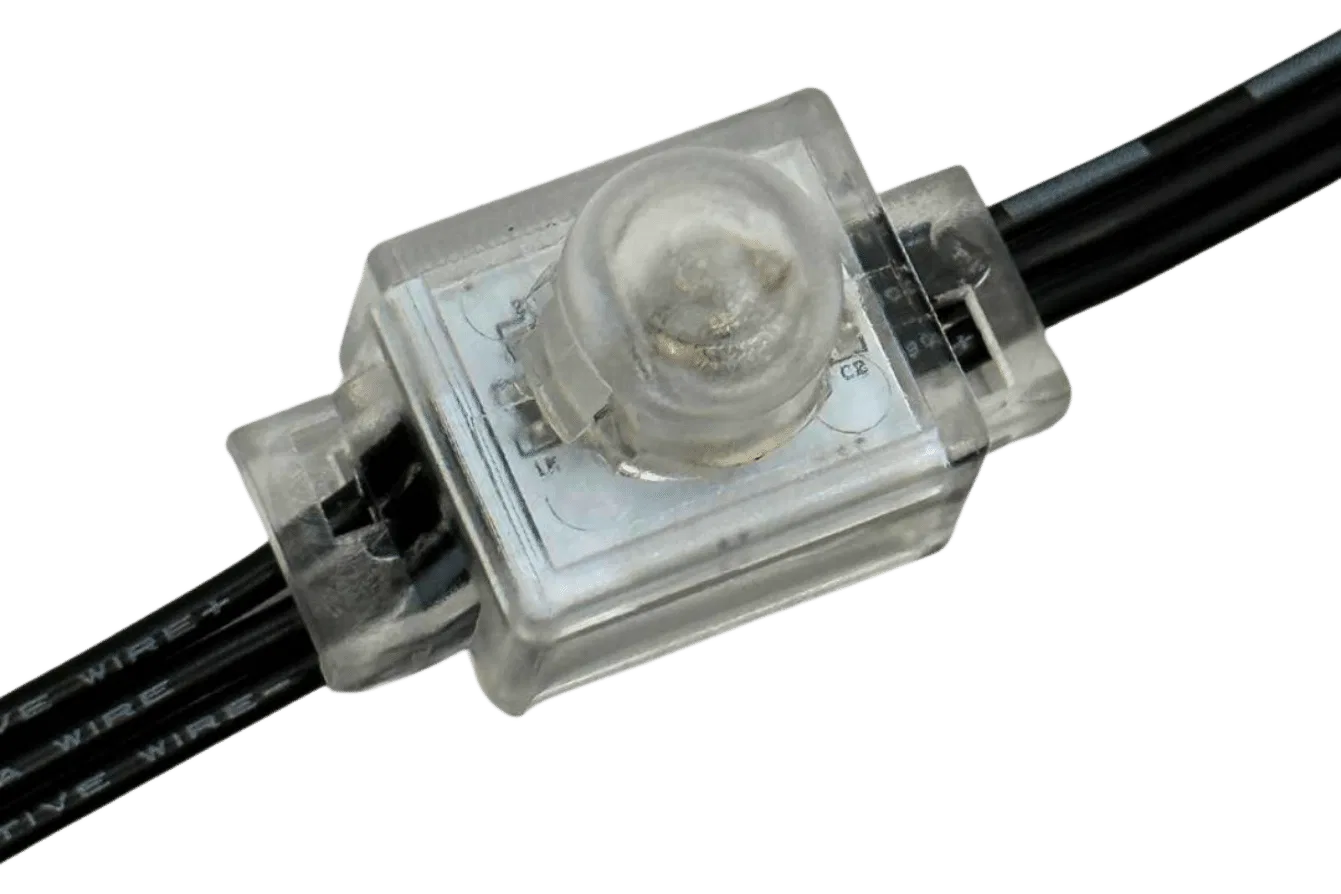Close-up of a transparent waterproof LED module with two black wires connected on either side, showing internal components and a dome-shaped lens on top.