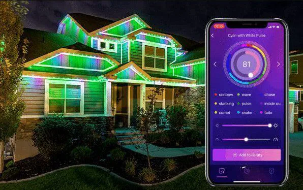 A modern house is decorated with colorful, app-controlled LED lights along the roofline. In the foreground, a smartphone displays the lighting app with brightness and pattern options.